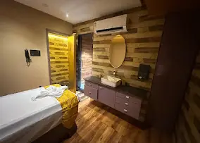 Private massage room with wash basin and vanity